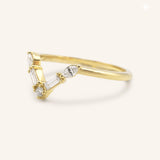Yellow gold Rosalina V diamond wedding band side view on white background