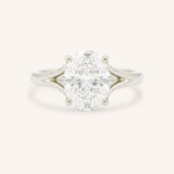 White Gold oval diamond split shank engagement ring on white background