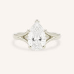 White Gold pear cut diamond split shank engagement ring on white background