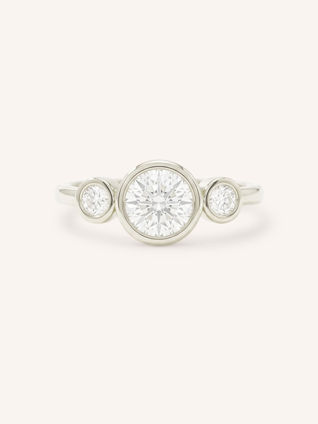 White Gold Tamara Round Three Stone Diamond Bezel Engagement Ring front view on white background