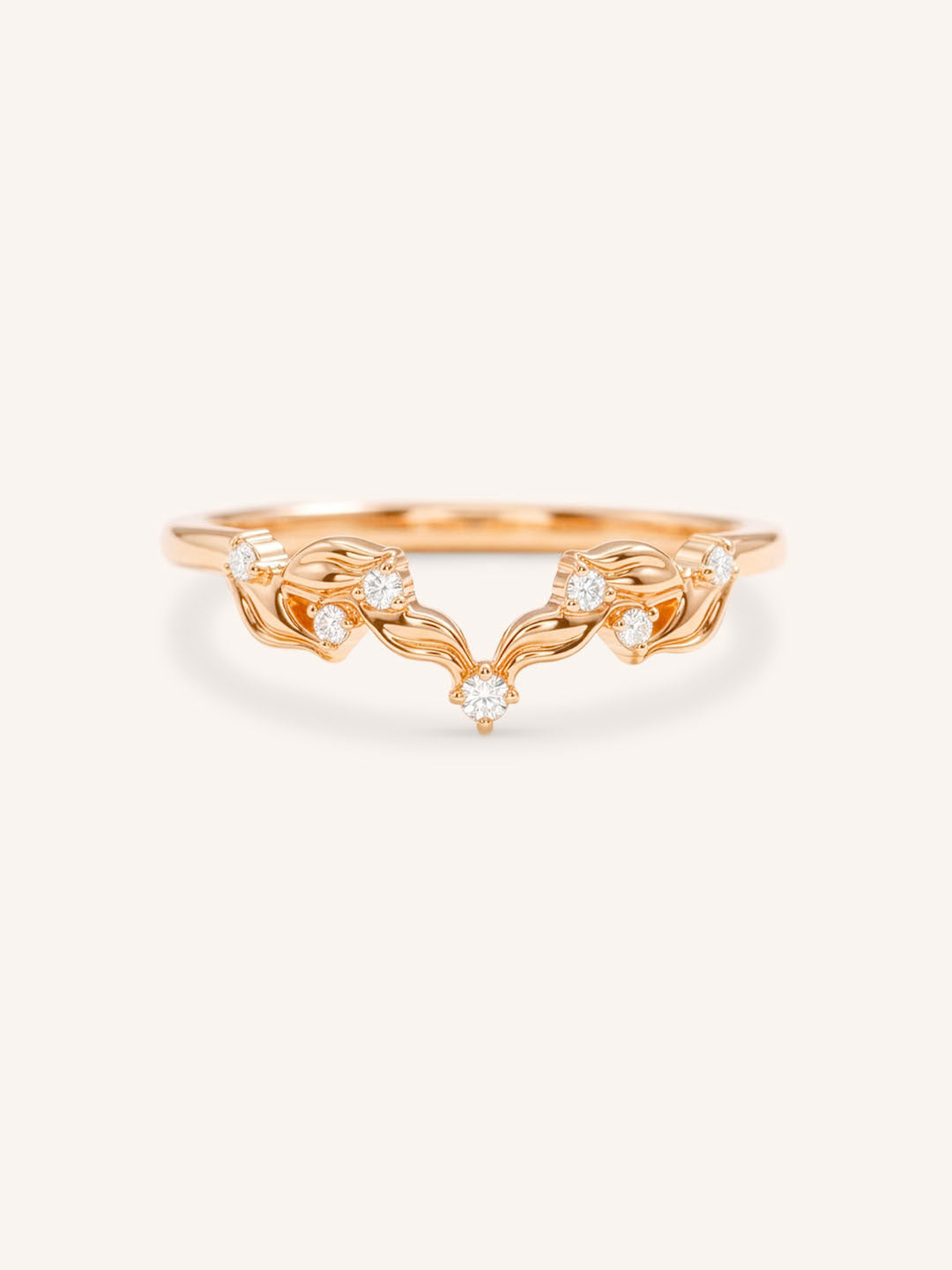 Rose gold Wildwood diamond curved ring front view on white background