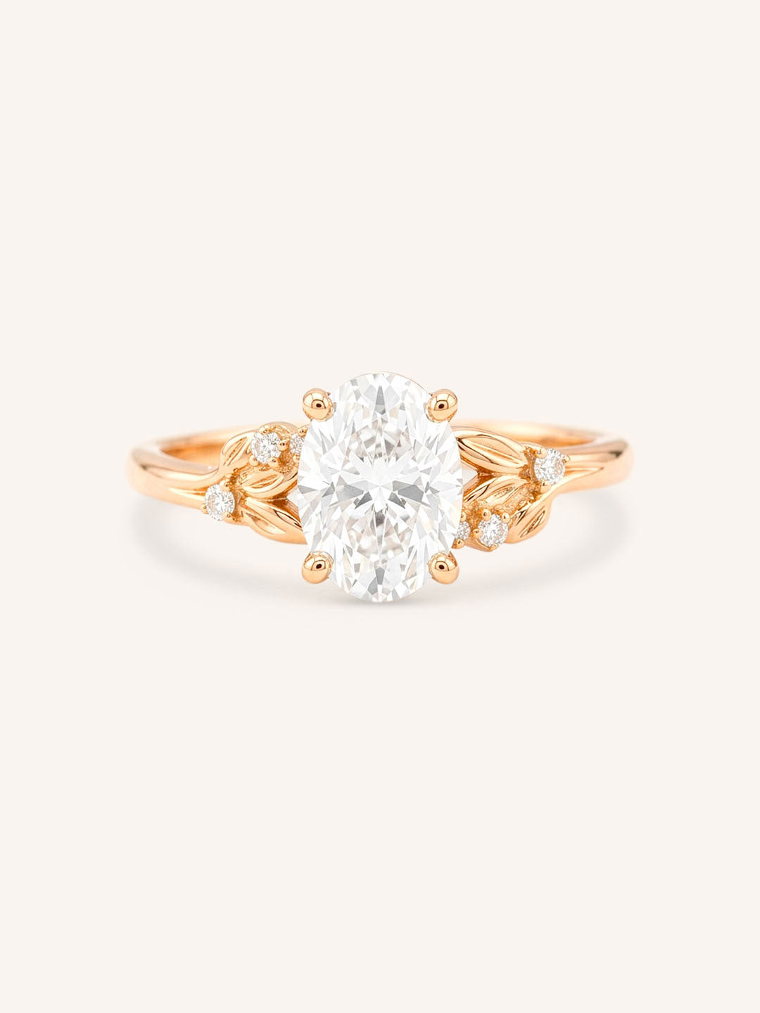 Rose gold floral oval diamond engagement ring front view on white background