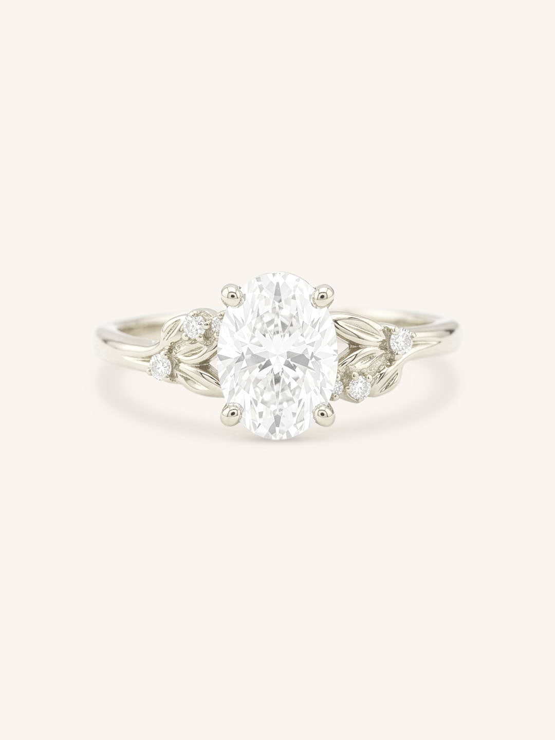 White gold floral oval diamond engagement ring front view on white background