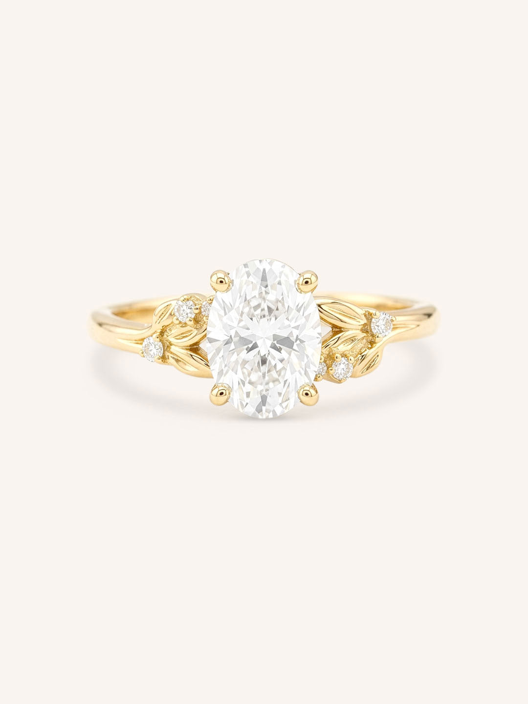 Yellow gold floral oval diamond engagement ring front view on white background