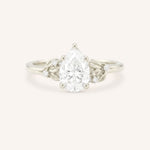White gold floral pear diamond engagement ring front view on white background