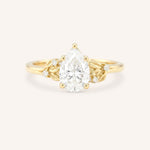 Yellow gold floral pear diamond engagement ring front view on white background