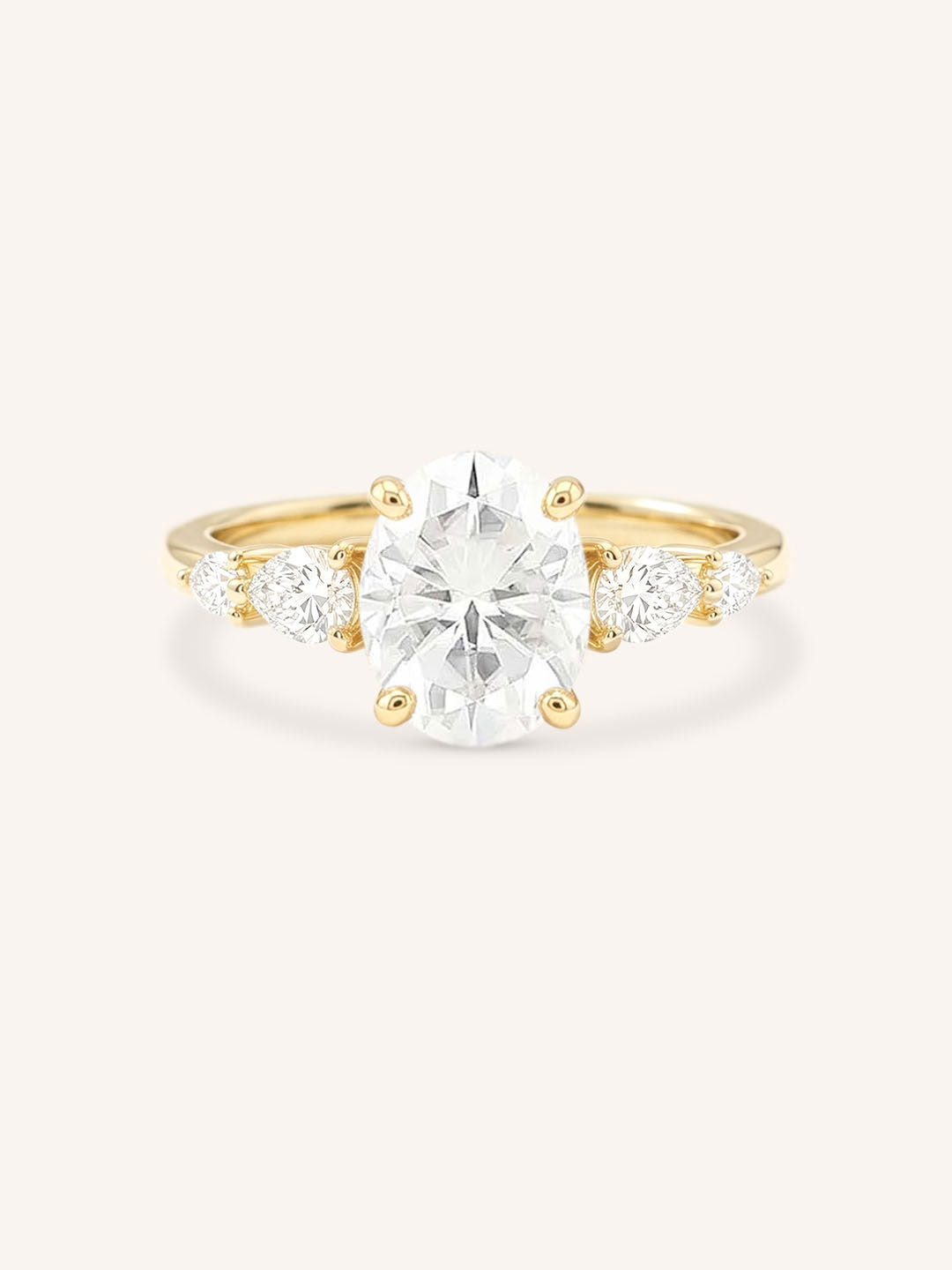 Yellow gold Bella oval diamond engagement ring front view on white background