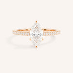 Rose gold marquise diamond solitaire engagement ring with diamond accents front view on white background
