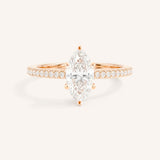Rose gold marquise diamond solitaire engagement ring with diamond accents front view on white background