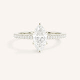 White gold marquise diamond solitaire engagement ring with diamond accents front view on white background