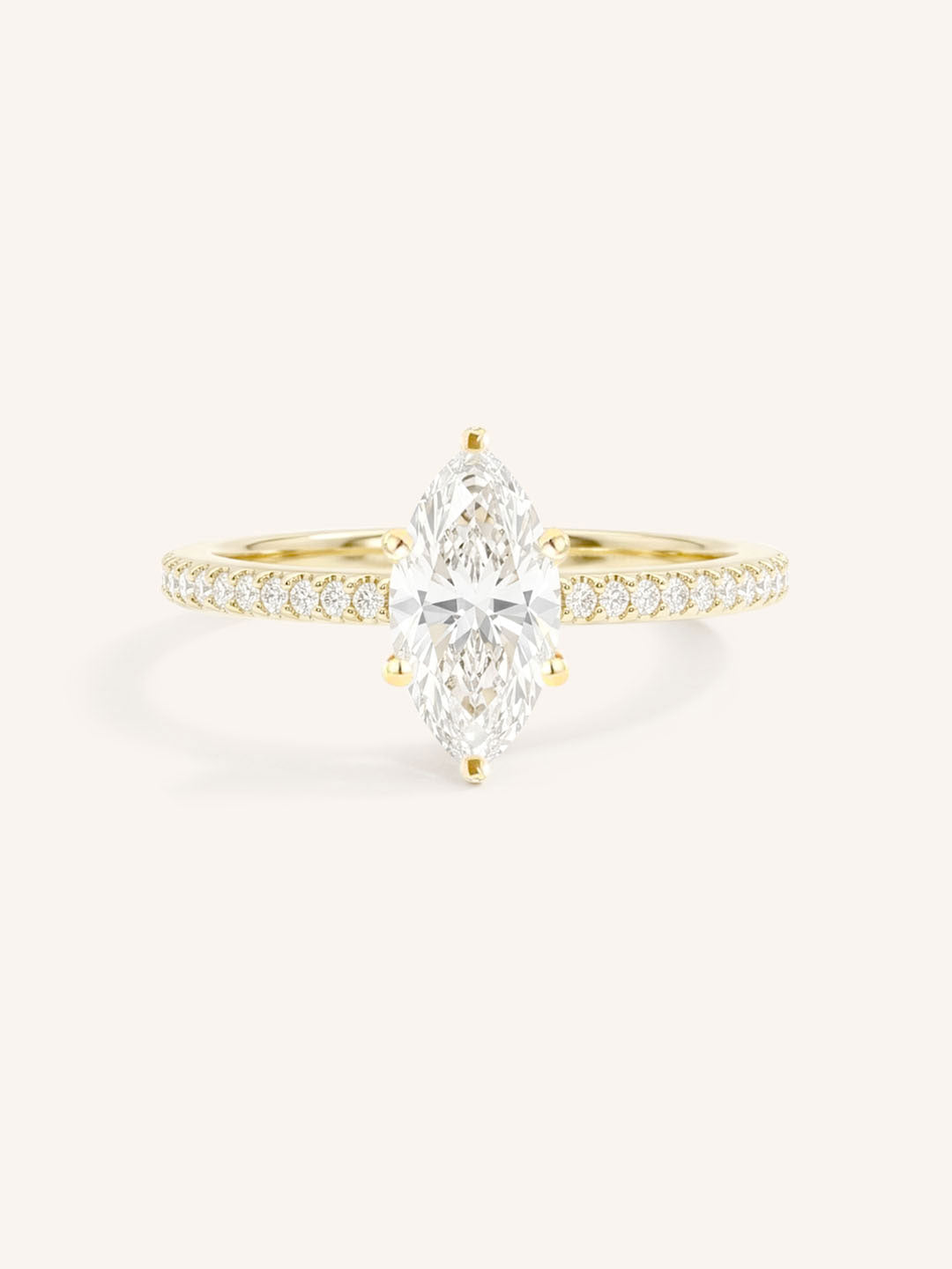 Yellow gold marquise diamond solitaire engagement ring with diamond accents front view on white background