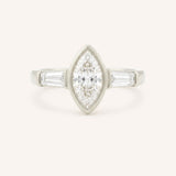 White gold Grannis marquise three stone and baguette diamond engagement ring front view on white background