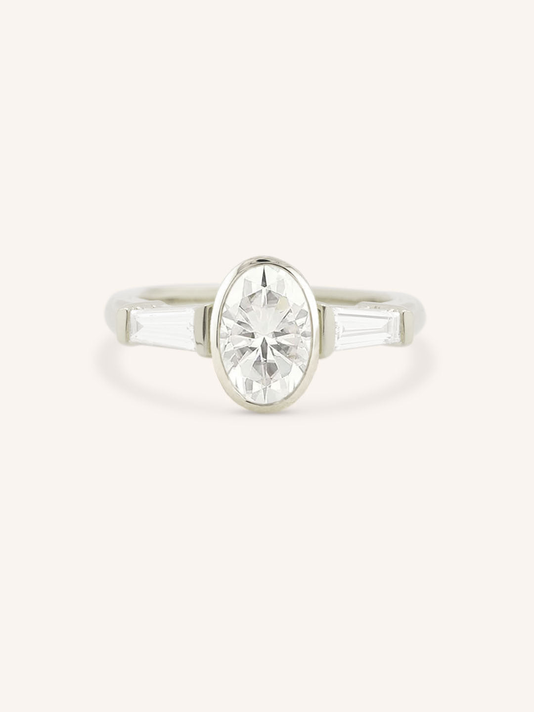 Grannis Three Stone Oval and Baguette Diamond Engagement Ring