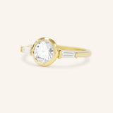 Grannis Three Stone Round and Baguette Diamond Engagement Ring