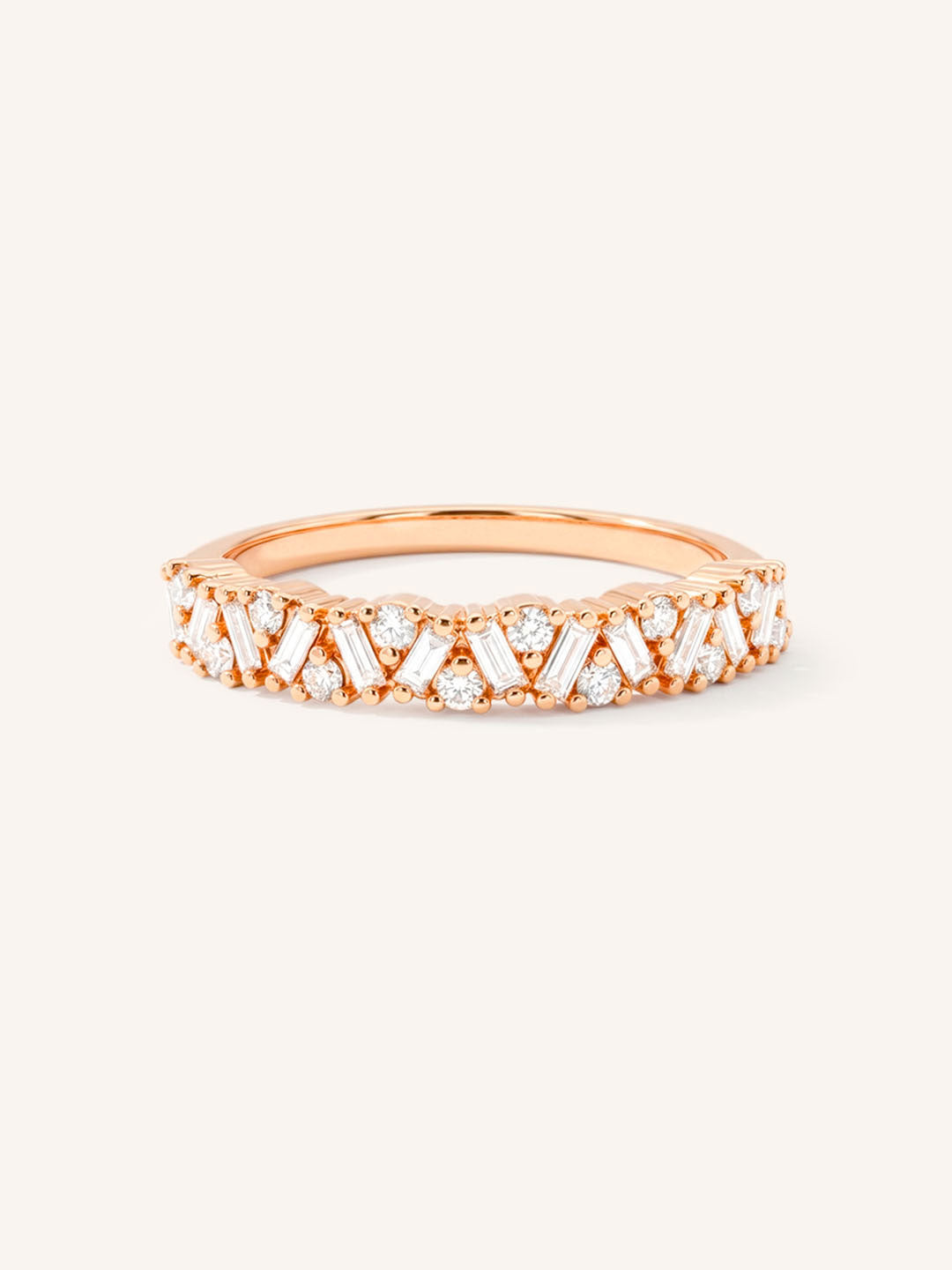 Rose gold round band scattered cluster diamond ring front view on white background