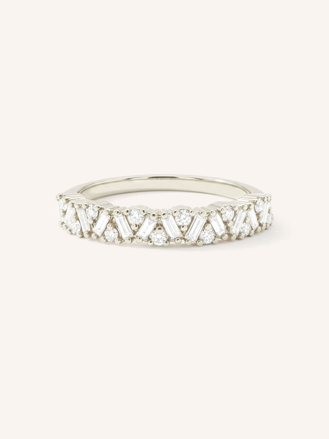 White gold round band scattered cluster diamond ring front view on white background