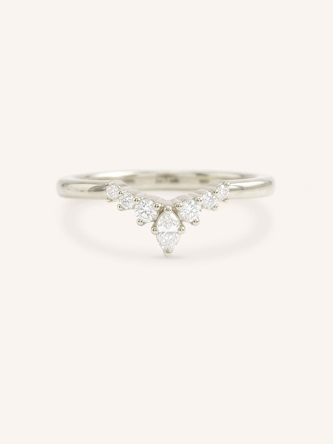 White gold Kessel curved diamond wedding band front view on white background