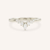 White gold Kessel curved diamond wedding band front view on white background