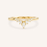 Yellow gold Kessel curved diamond wedding band front view on white background
