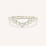 White gold Glissad curved diamond wedding band front view on white background