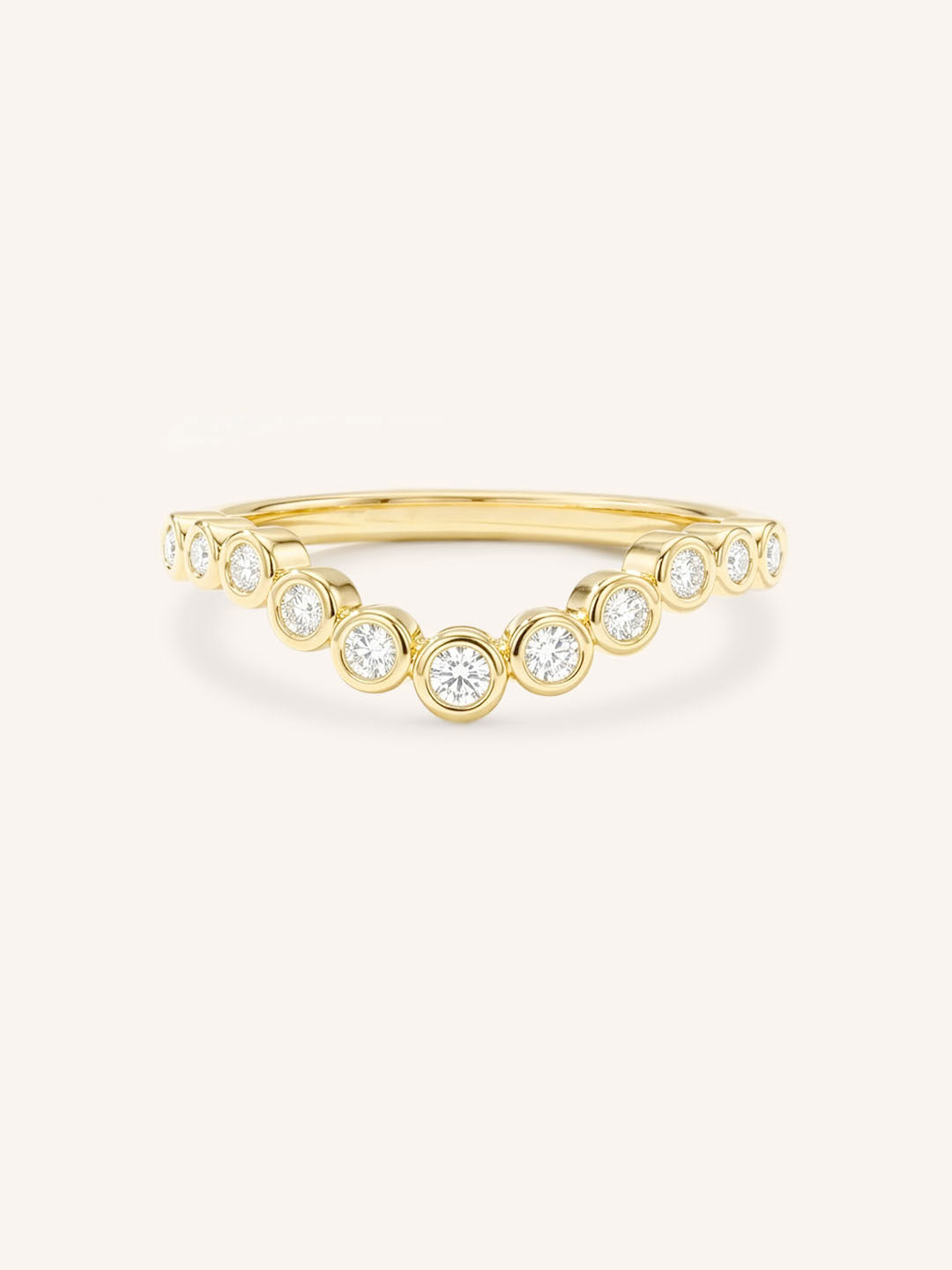 Yellow gold Glissad curved diamond wedding band front view on white background