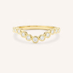 Yellow gold Glissad curved diamond wedding band front view on white background