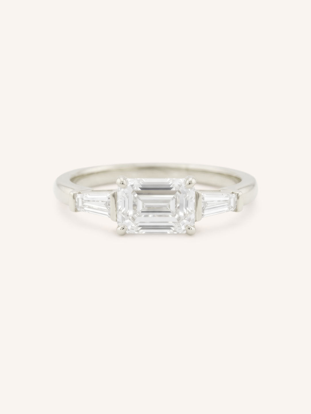 Three Stone Emerald Cut Diamond East-West Engagement Ring