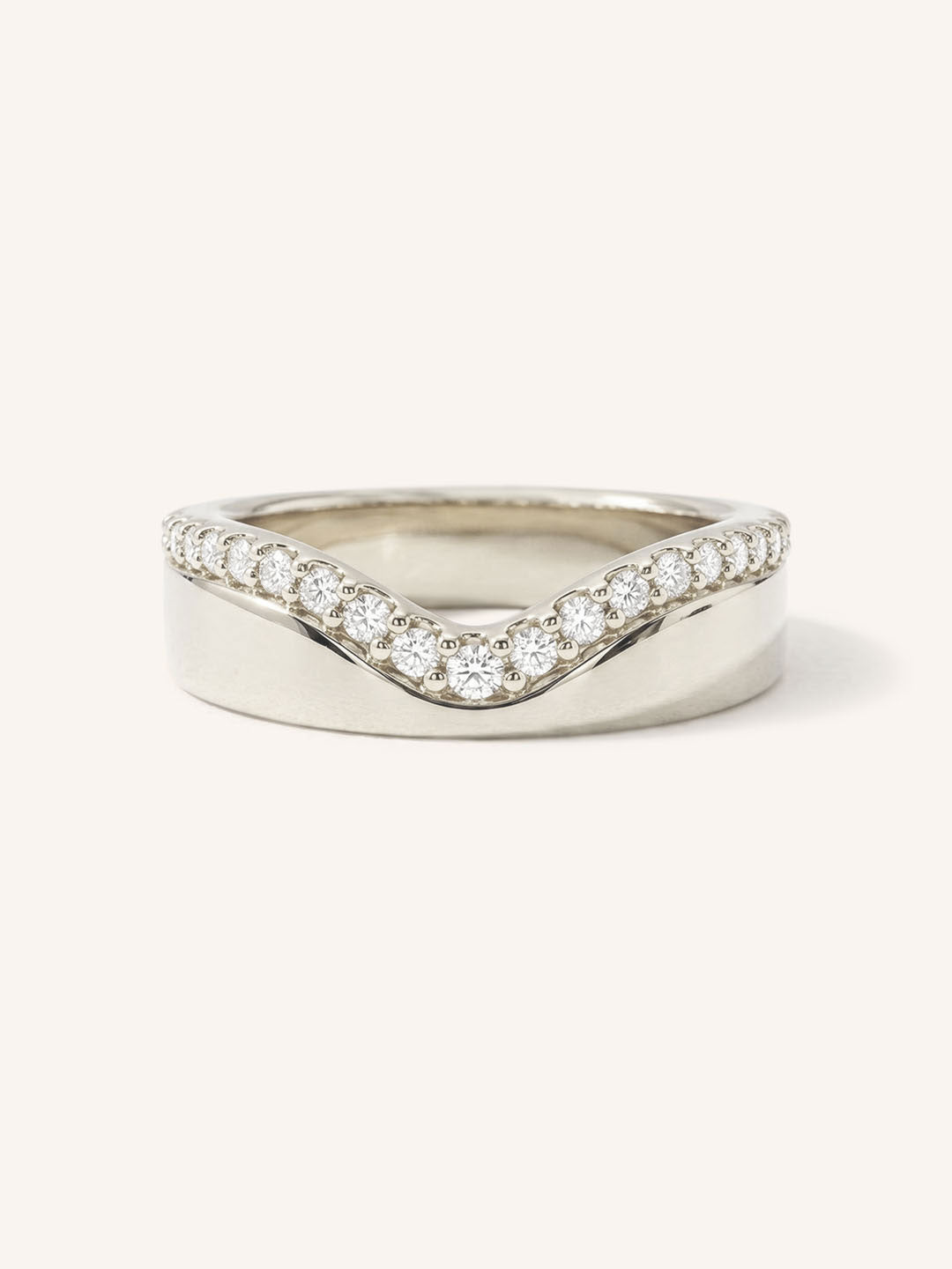 White gold curved diamond ring front view on white background