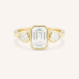 Jessie Emerald Cut and Pear Diamond Bezel Three Stone Engagement Ring