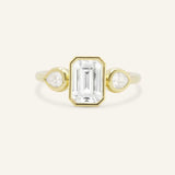 Jessie Emerald Cut and Pear Diamond Bezel Three Stone Engagement Ring
