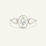 Jessie Oval and Pear Diamond Bezel Three Stone Engagement Ring