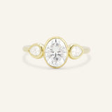 Jessie Oval and Pear Diamond Bezel Three Stone Engagement Ring