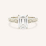 White gold Whera emerald cut diamond solitaire engagement ring front view on white background
