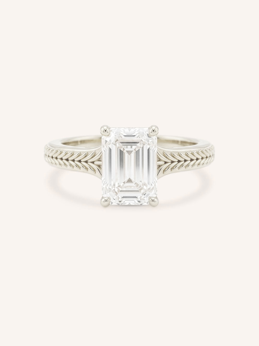 White gold Whera emerald cut diamond solitaire engagement ring front view on white background