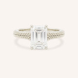 White gold Whera emerald cut diamond solitaire engagement ring front view on white background