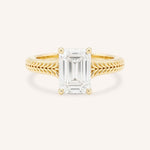 Yellow gold Whera emerald cut diamond solitaire engagement ring front view on white background