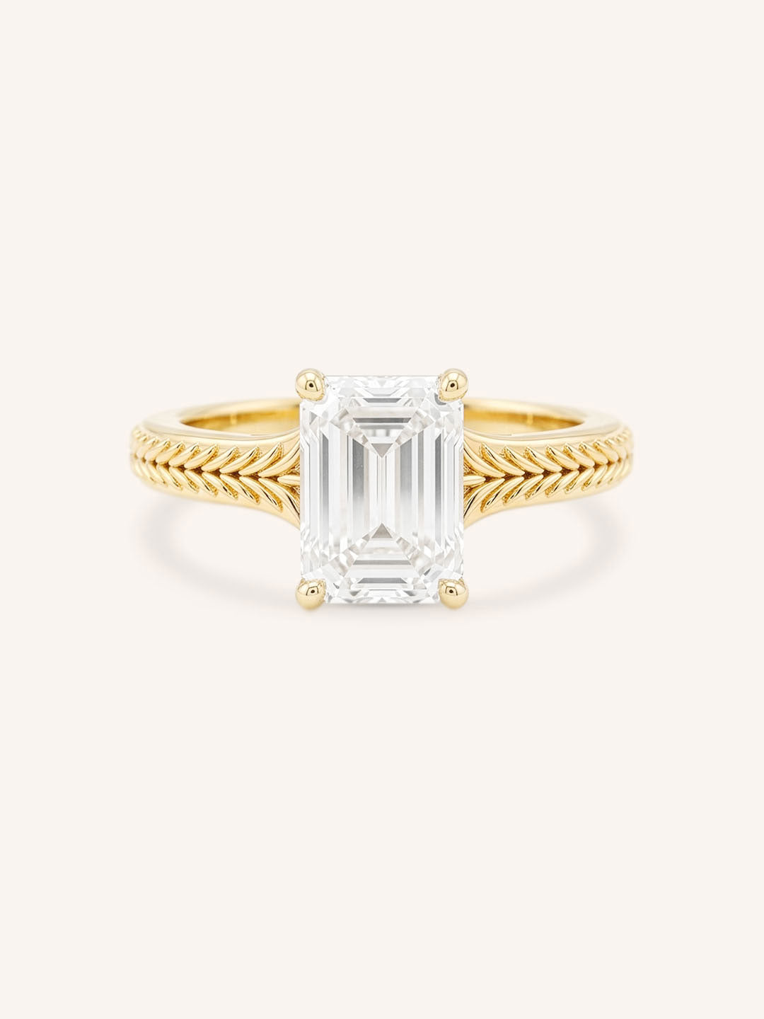 Yellow gold Whera emerald cut diamond solitaire engagement ring front view on white background