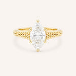 Yellow gold Whera marquise diamond solitaire engagement ring front view on white background