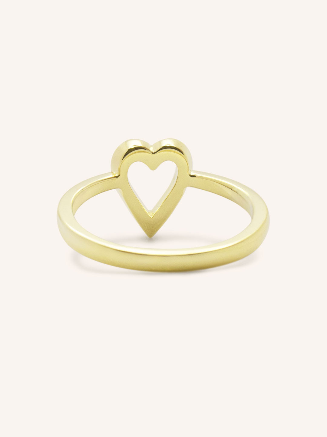 Yellow gold accented heart diamond ring back view on white background