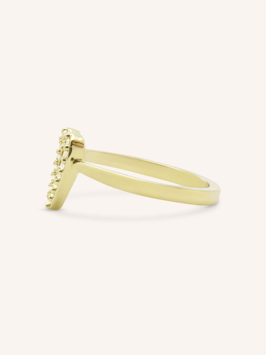 Yellow gold accented heart diamond ring side view on white background