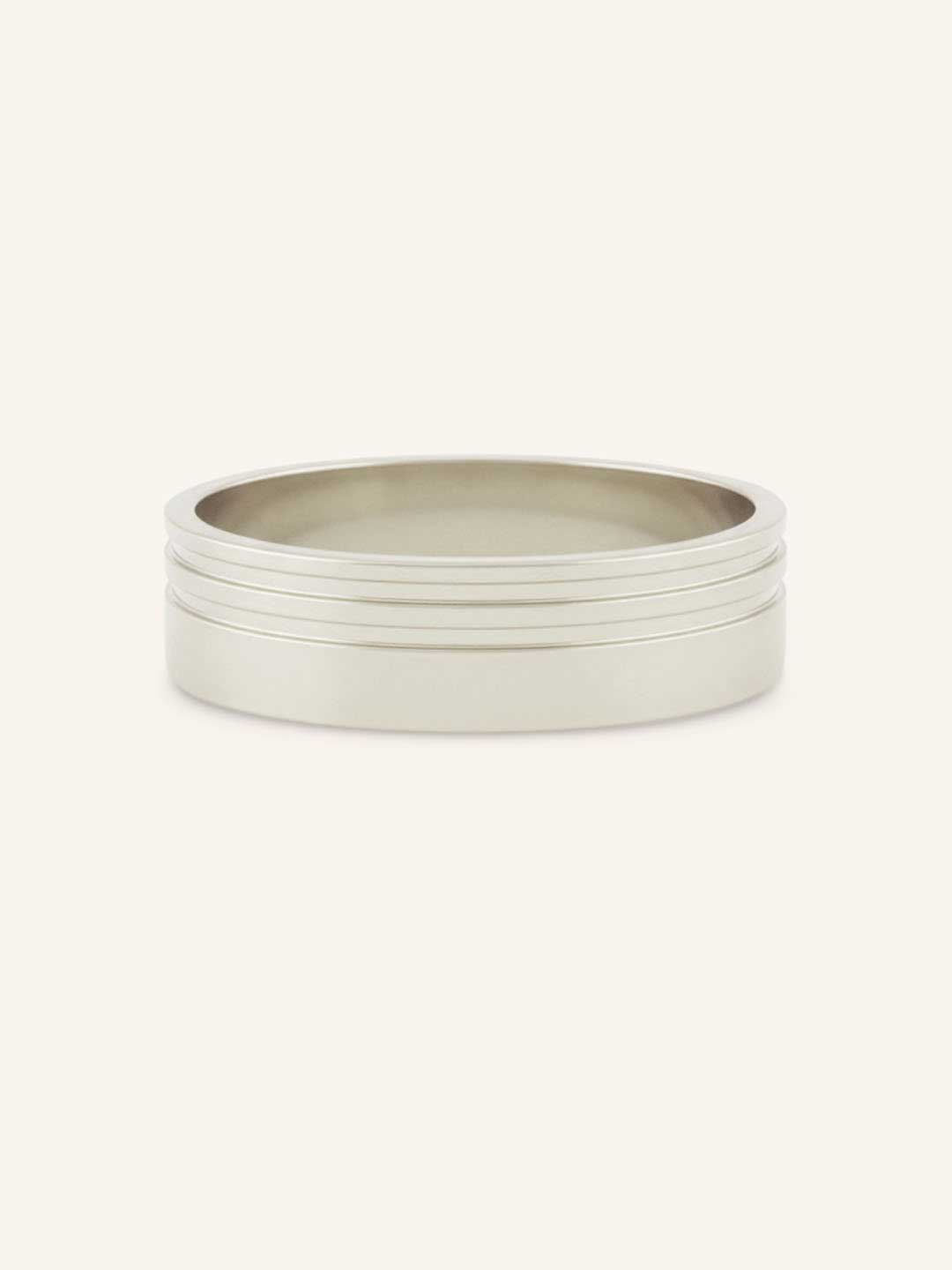 White gold dualine 6mm grooved flat band on white background