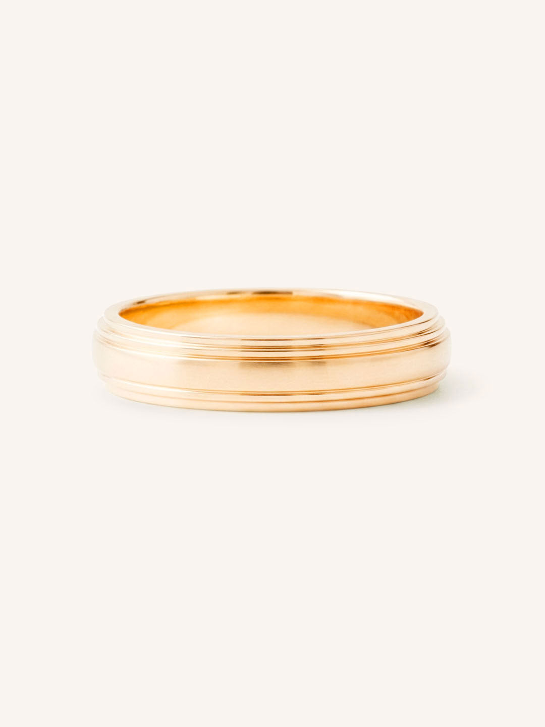 Rose gold double stepped edge 3mm wedding band on white background