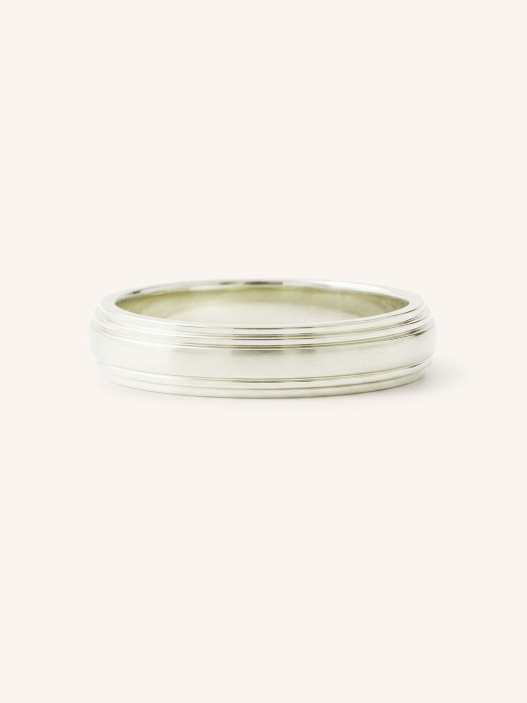White gold double stepped edge 3mm wedding band on white background