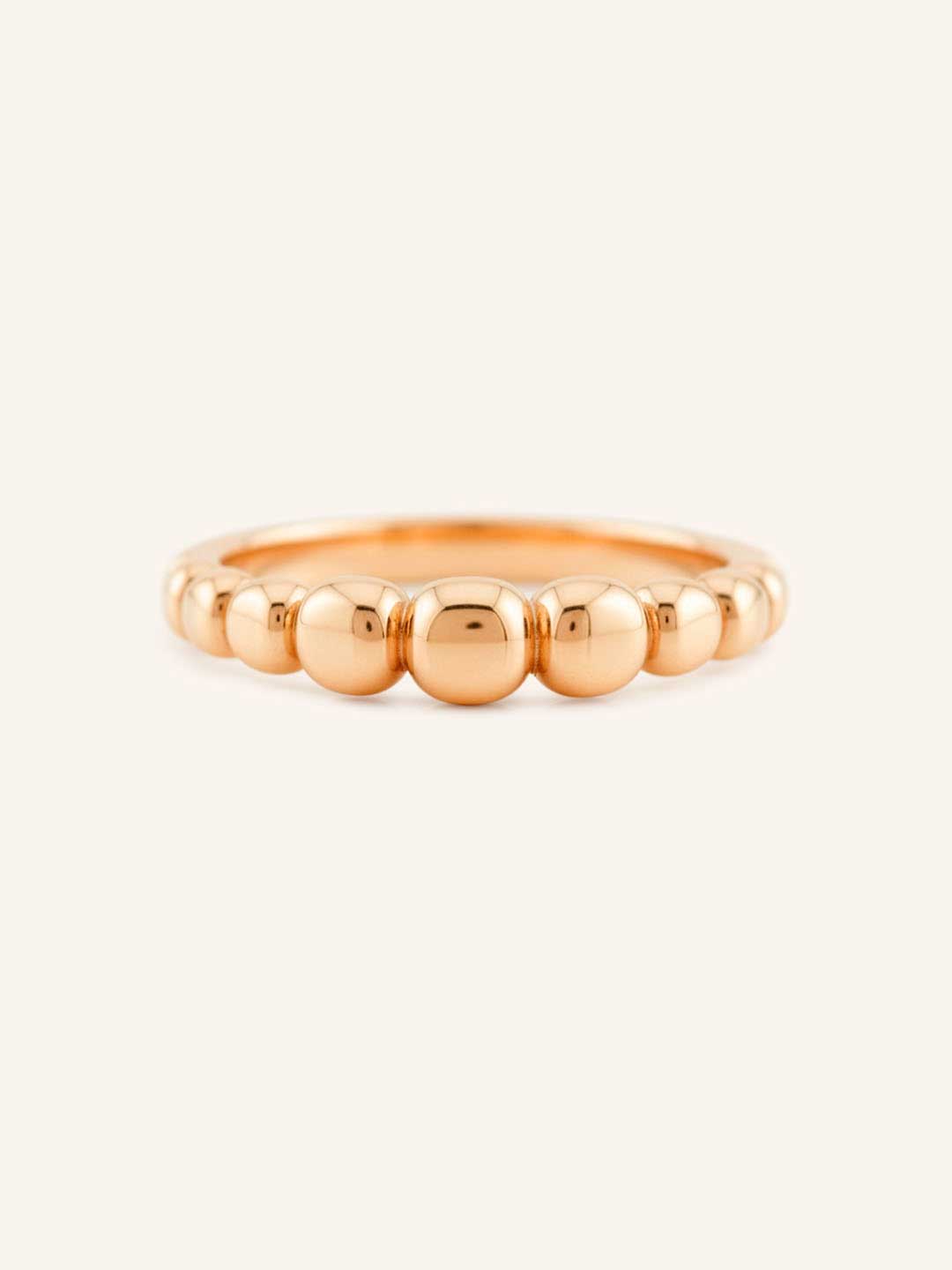 Rose gold geometric domed ring front view on white background