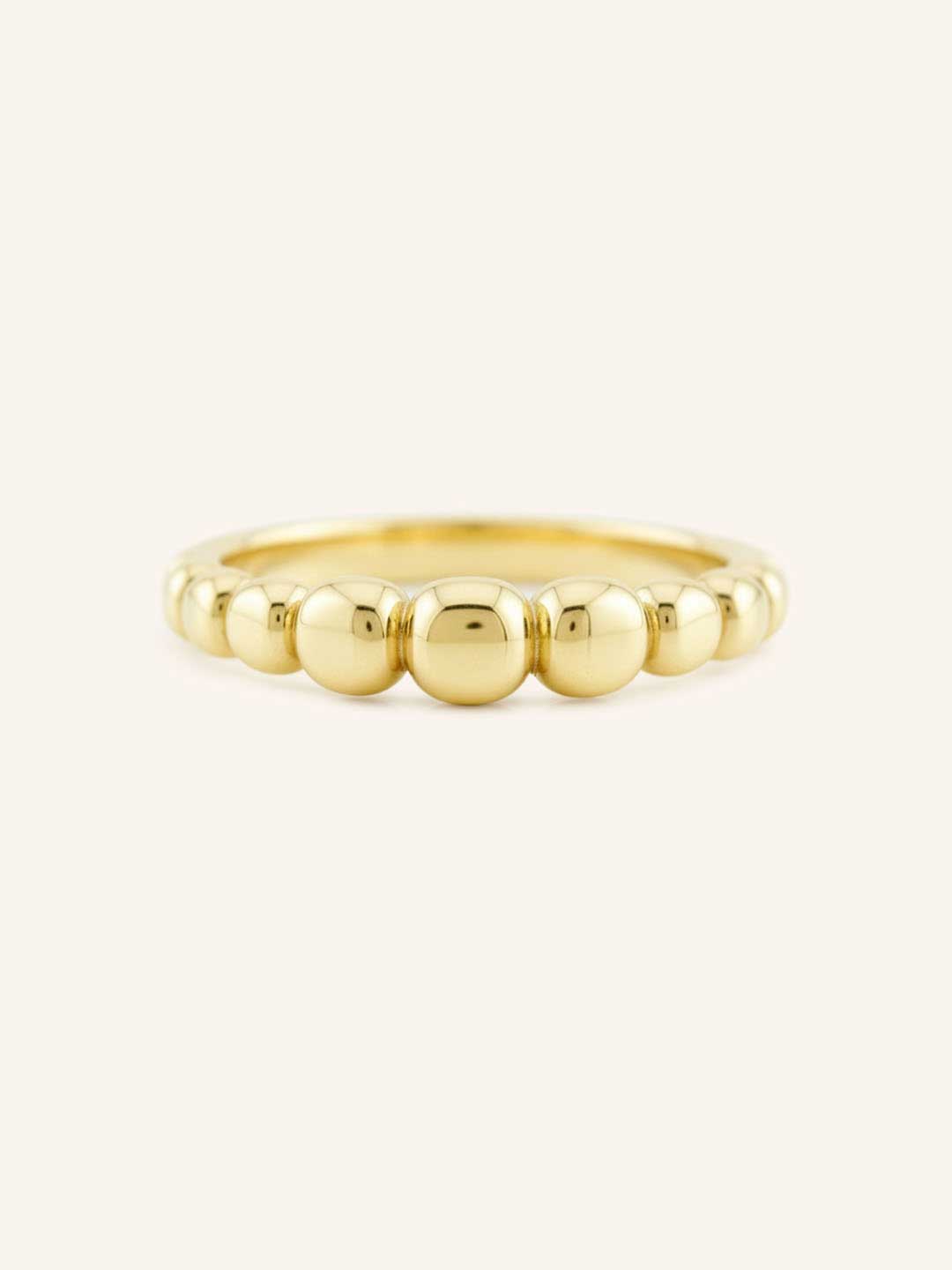 Yellow gold geometric domed ring front view on white background