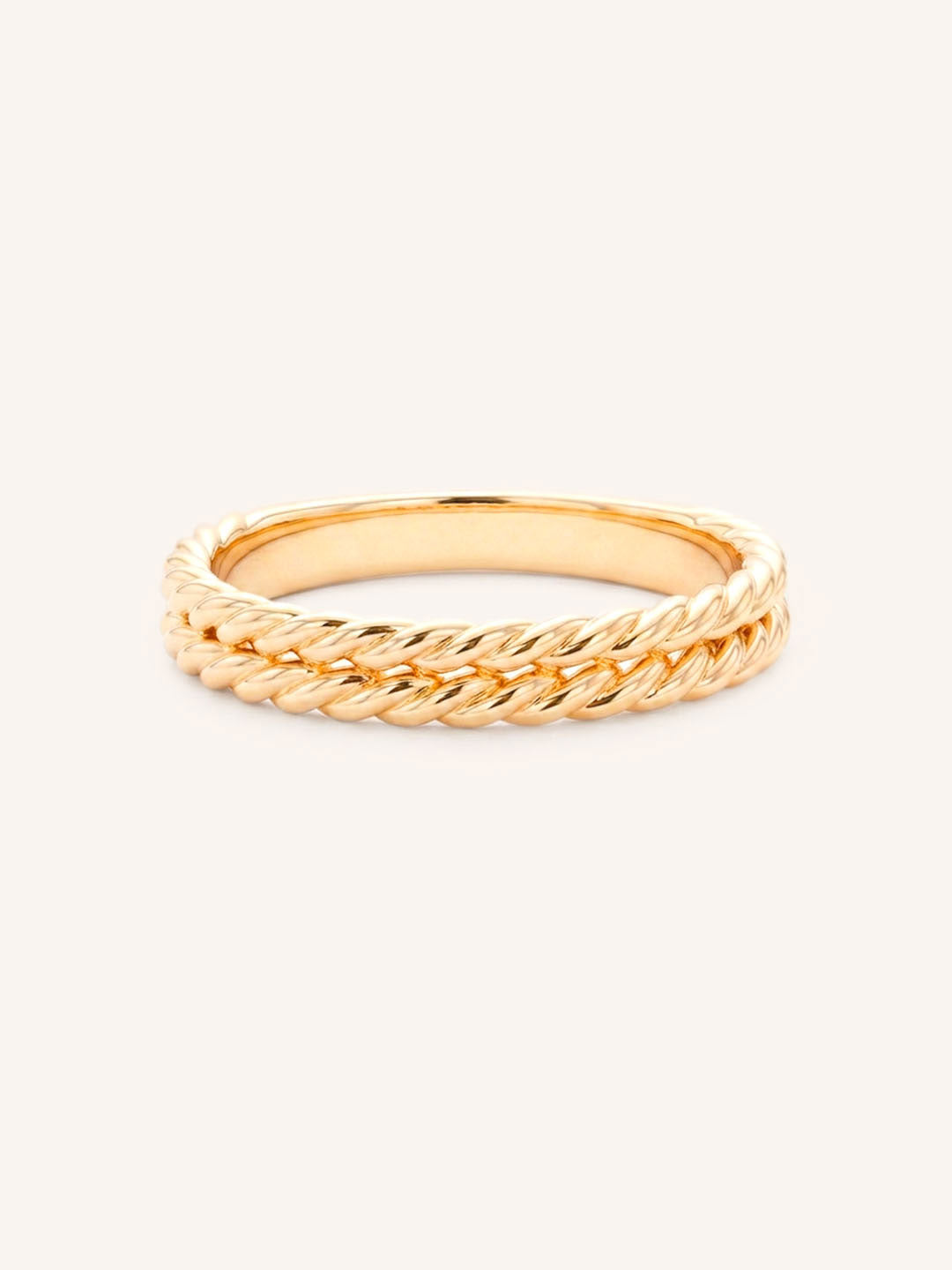 Rose gold double rope band ring front view on white background