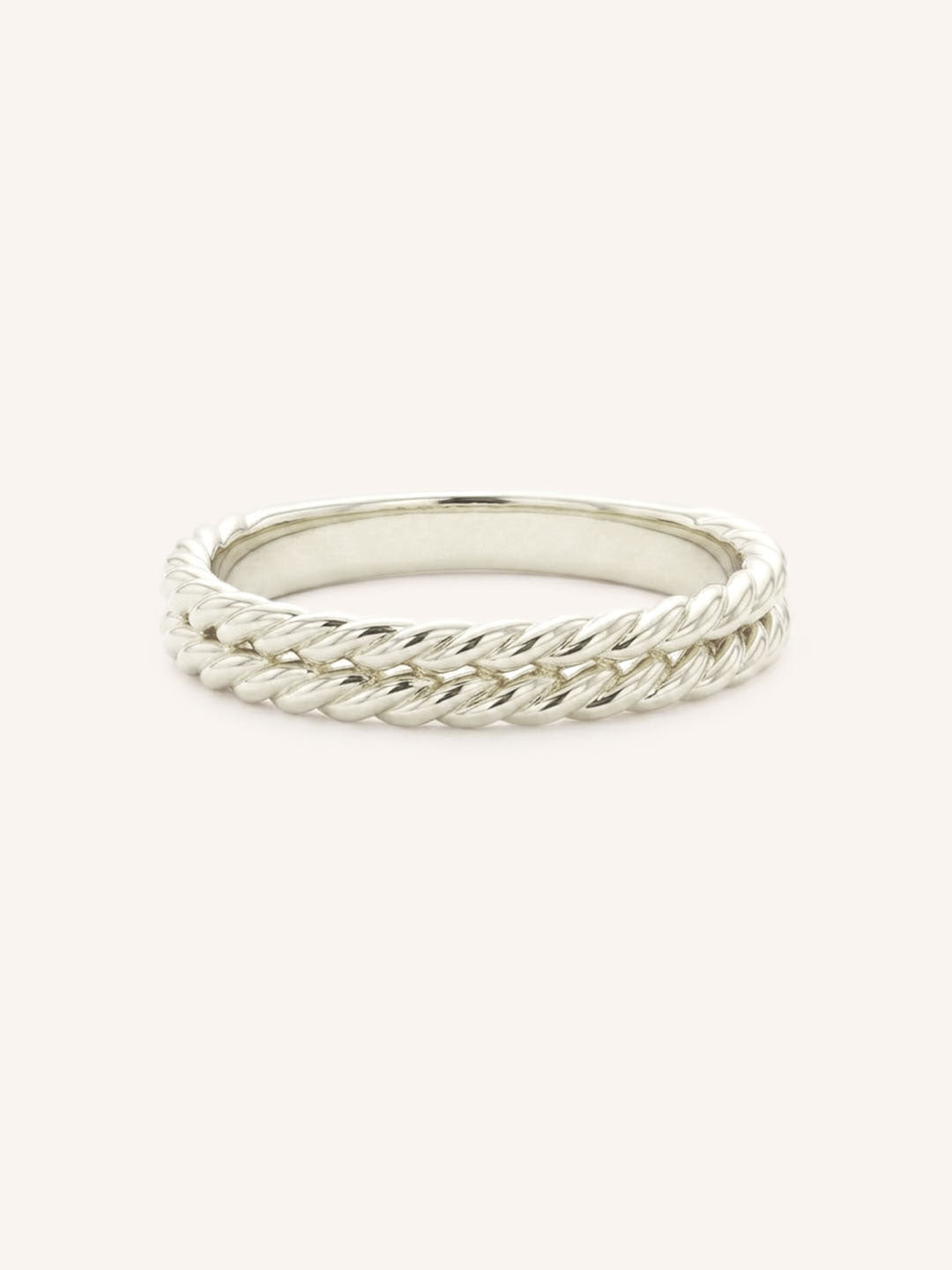 White gold double rope band ring front view on white background