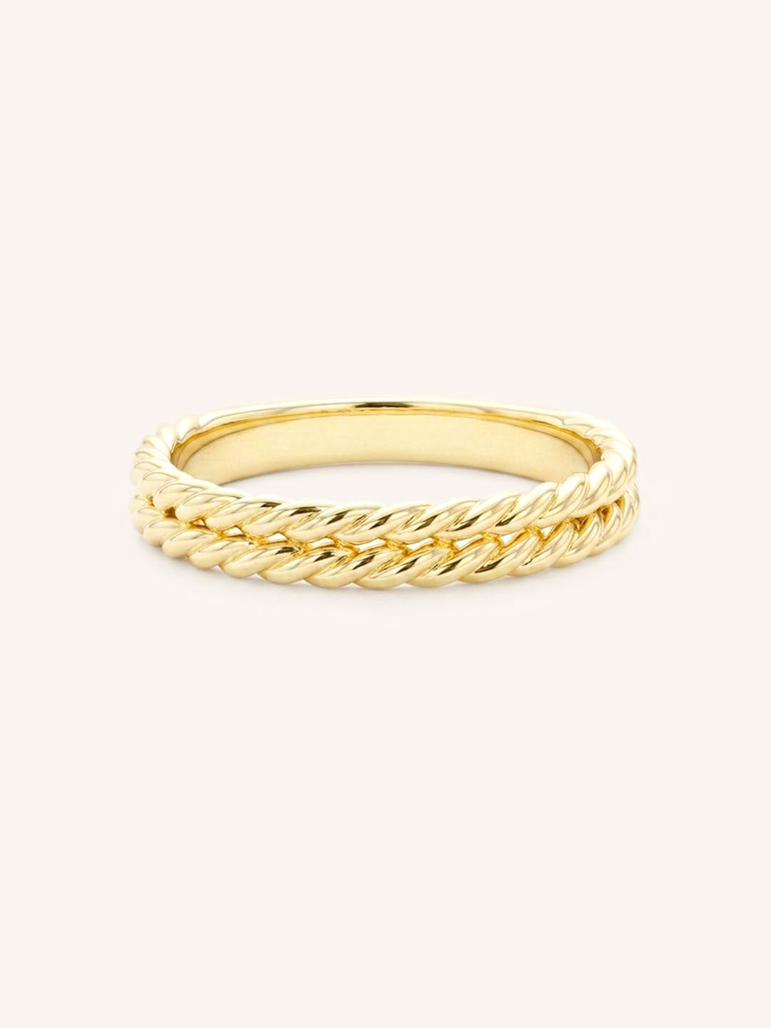 Yellow gold double rope band ring front view on white background