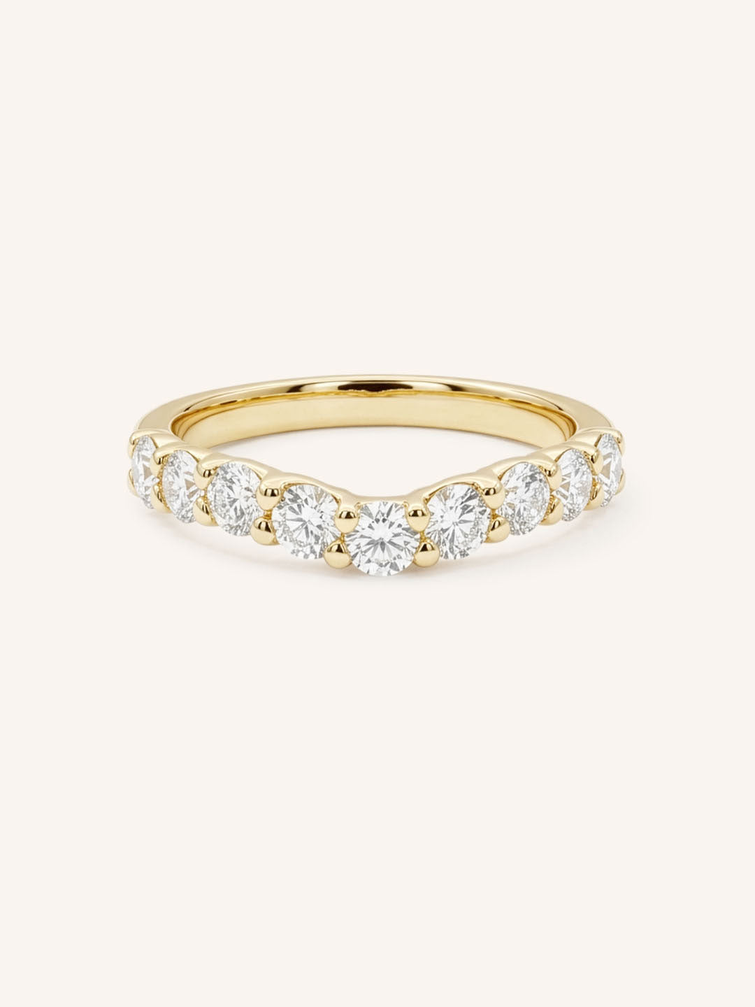 Yellow gold Lavale curved diamond wedding band front view on white background