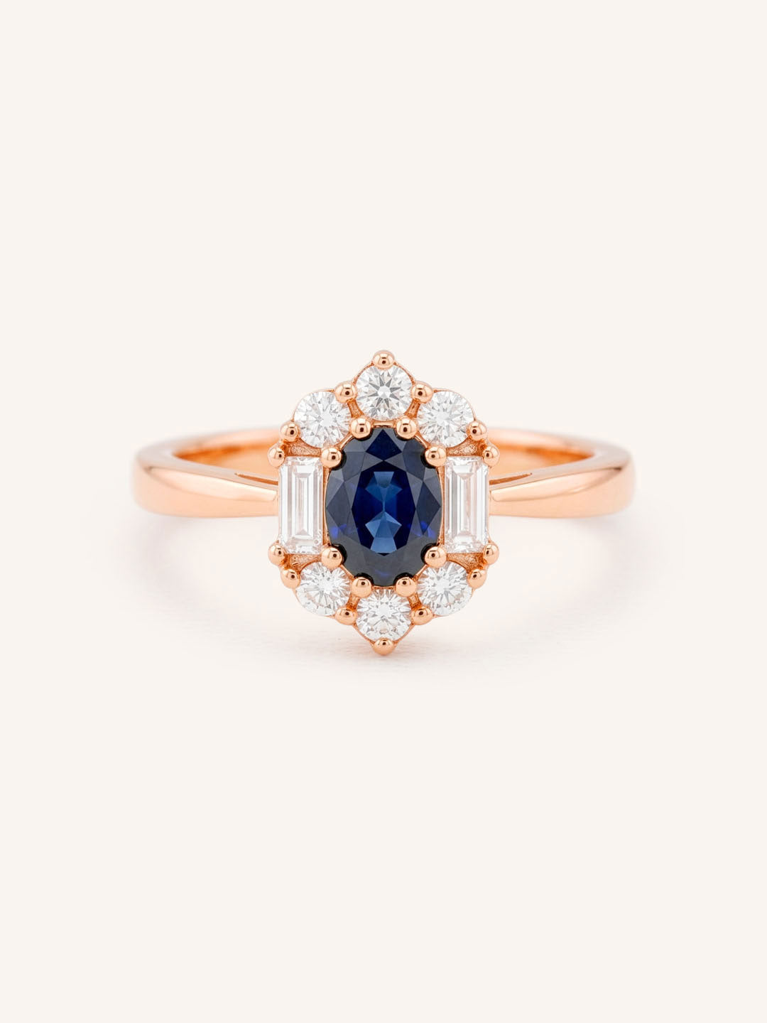 Rose Gold Wyona Oval Blue Sapphire Halo Style Ring front view on white background